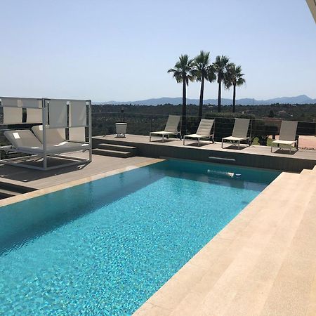 Eden Roc Villa Portol Bagian luar foto